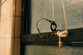 Close up shot of a window latch inside The Nicholas Building.