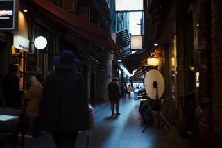 People walking through Centreway Arcade.